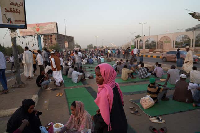 Protesters gather in front of the military headquarters to break their Ramadan fast on May 07, 2019 in Khartoum, Sudan