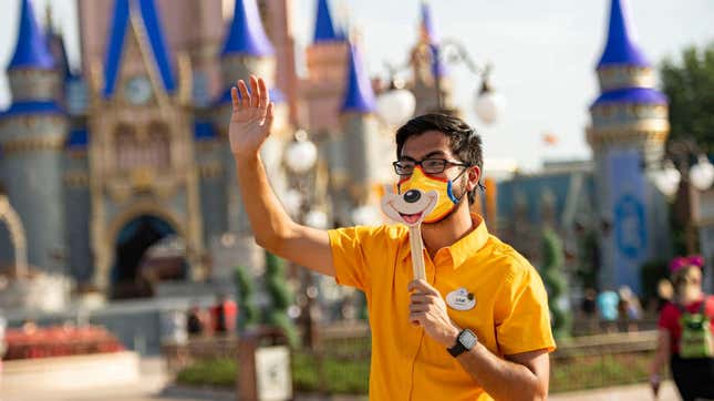 A cast member greets guests during the reopening of Walt Disney World on July 11. 