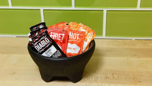 Array of Taco Bell sauces in salsa bowl