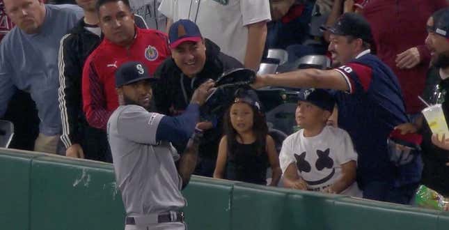 Domingo Santana Caught A Foul Ball And A Fan's Glove
