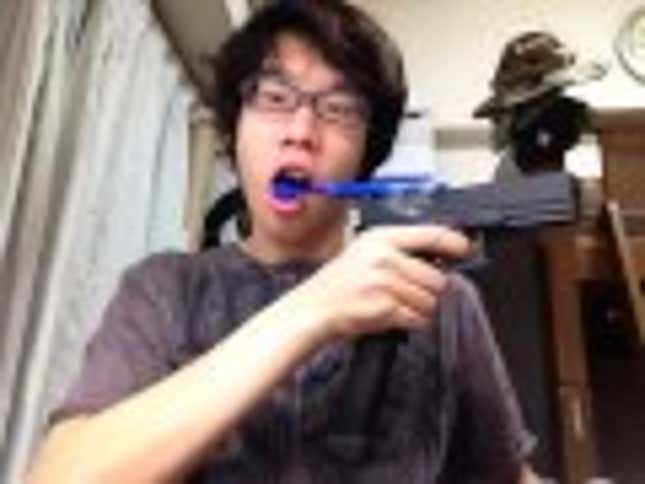 Brushing Your Teeth With A Gun Is A Terrible Idea