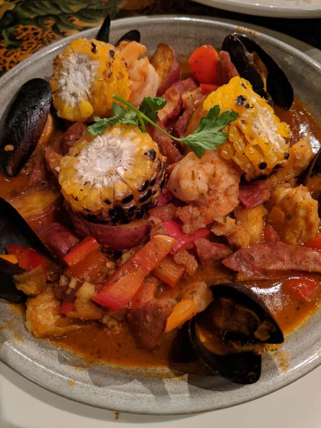 African Seafood Stew. I appreciate a blistered corn cob.