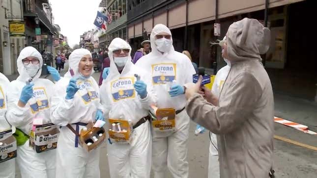 Revelers make fun of the coronavirus pandemic during Mardi Gras in New Orleans, Louisiana on February 25, 2020.
