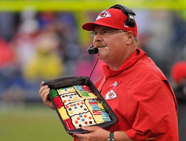 Image for article titled Andy Reid Carefully Consulting Chiefs Playcall Sheet Cake