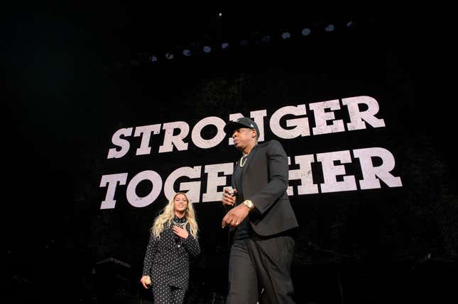 Image for article titled Jay-Z Might Be Past Kneeling, But He’s Not Past Explaining Why He and Beyoncé Sat During the Super Bowl National Anthem