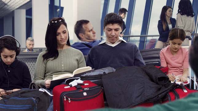 Image for article titled Family With 2-Hour Layover Sets Up Rough Shantytown At Airport Gate