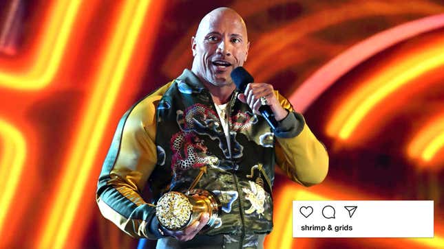 The Rock onstage accepting an MTV Movie Award