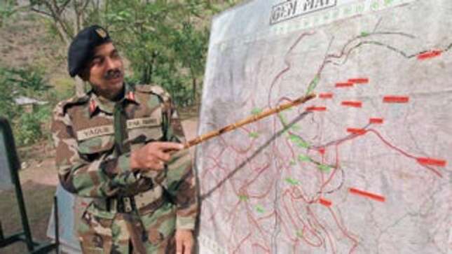 A Pakistani official shows exactly where the 5:23 a.m. sharp—no later—strike will occur.