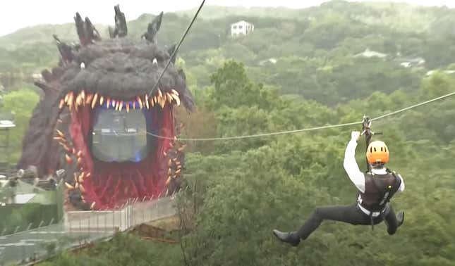 Image for article titled Watch People Zipline Into Godzilla&#39;s Mouth