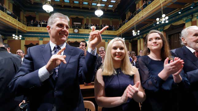Marc Mallory, left, with daughters
