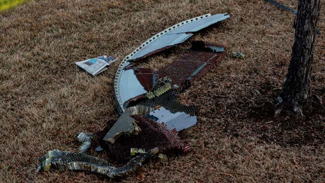 Debris fallen from a United Airlines airplane’s engine lay scattered through the neighborhood of Broomfield, outside Denver, Colorado, on February 20, 2021. 