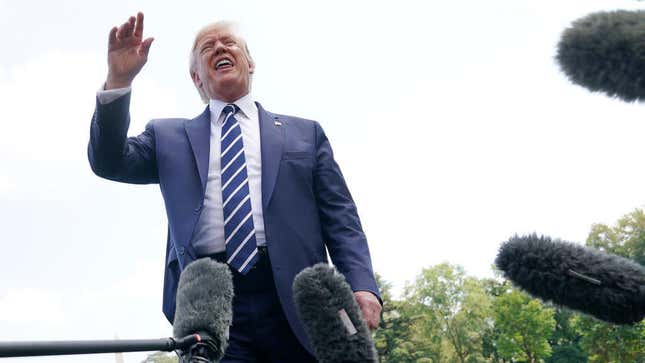 Donald Trump talks with reporters as he departs the White House July 19, 2019, for golfing at his New Jersey club.