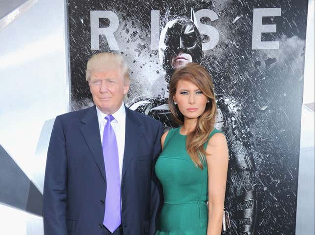 Donald and Melania Trump, with Batman looming in the background, at the July 16, 2012, New York premiere of “The Dark Knight Rises”