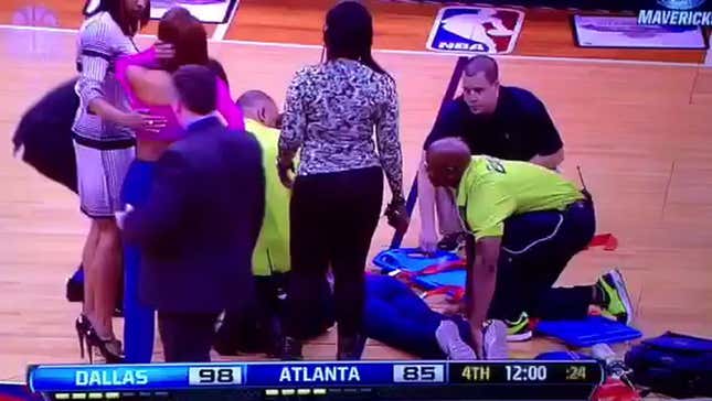 Atlanta Cheerleader Carted Off Court After Bizarre Injury