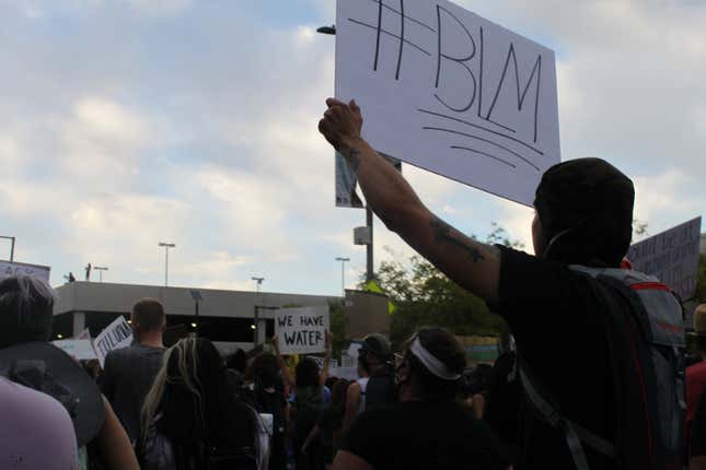 Phoenix, Ariz., US - June 5, 2020: A crowd protesting police brutality marches through downtown.