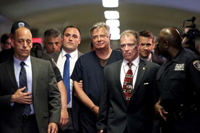 Former Trump campaign chairman Paul Manafort, center, arrives to his arraignment in Manhattan Criminal Court, on June 27, 2019 in New York City. Manafort pleaded not guilty to mortgage fraud and other criminal charges filed by New York state authorities.