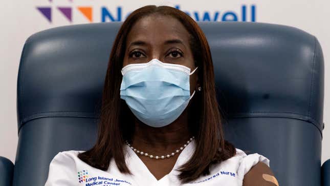 Image for article titled ICU Nurse Receives First Public Covid-19 Vaccine In U.S., Got a Cool Sticker Too