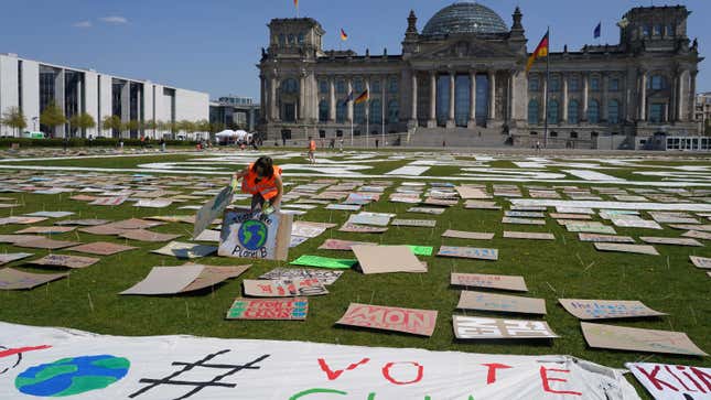Activists with Greta Thunberg’s Fridays for Future movement stage a protest for the coronavirus era outside Germany’s Reichstag.