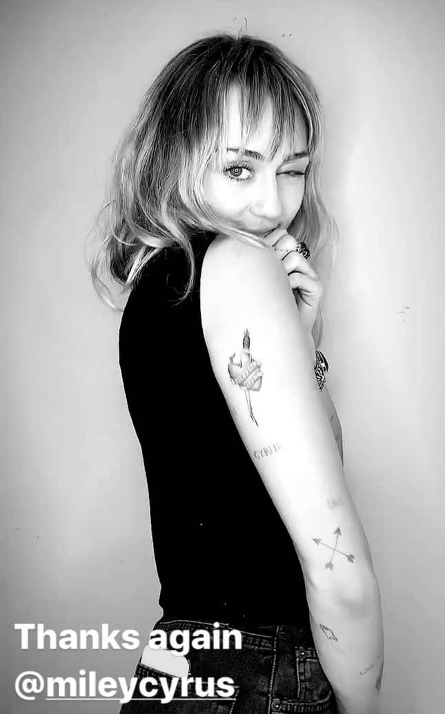 Image for article titled Miley Cyrus Joins Myspace in Spirit, Gets 'Rock n Roll' Heart Tattoo