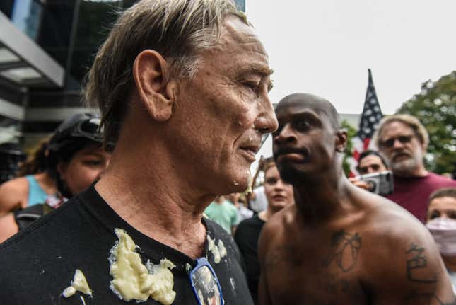 An alt-right demonstrator is covered in mayonnaise after being chased by a group of counter-protesters during an alt-right rally on August 17, 2019 in Portland, Oregon. Anti-fascism demonstrators gathered to counter-protest a rally held by far-right, extremist groups.