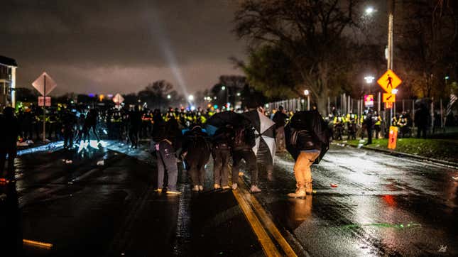 Demonstrators confront law enforcement outside the Brooklyn Center police headquarters on April 12, 2021 in Brooklyn Center, Minnesota. People have taken to the streets to protest after Daunte Wright, a 20-year-old Black man, was shot and killed by Brooklyn Center police officer Kimberly Potter during a traffic stop .