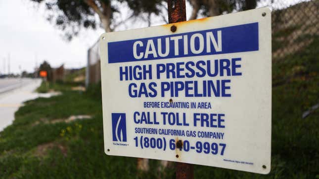A warning sign for a gas pipeline is mounted near the Scattergood Generating Station on February 12, 2019 in El Segundo, California.