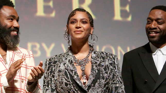 Donald Glover, left applauds Beyonce Knowles-Carter as Chiwetel Ejiofor looks on at the World Premiere of Disney’s The Lion King on July 09, 2019, in Hollywood, Calif.