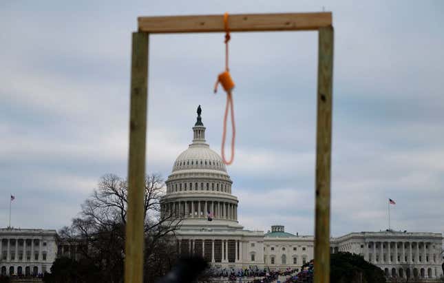  A noose is seen on makeshift gallows as supporters of US President Donald Trump gather on the West side of the U.S. Capitol in Washington, D.C., on January 6, 2021. 