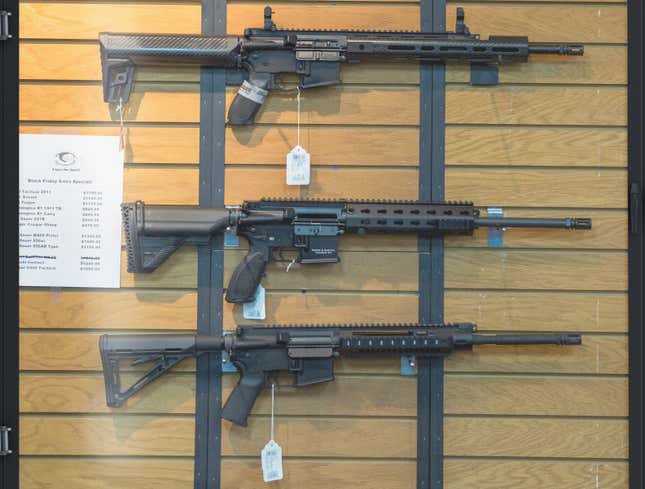 Image for article titled Glass-Encased AR-15 Behind Gun Shop Counter In Safest Hands It Will Ever Be