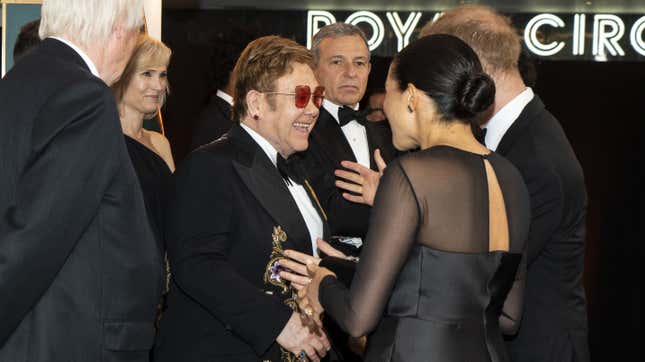 Image for article titled Elton John Now Implicated in Megxit