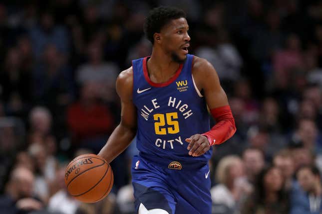 Malik Beasley of the Denver Nuggets brings the ball down the court against the Minnesota Timberwolves in the fourth quarter at the Pepsi Center on December 20, 2019 in Denver, Colorado.