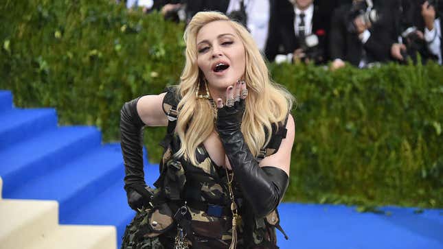 Image for article titled Madonna Has John Lennon's "Imagine" Lyrics Hanging Over Her Toilet