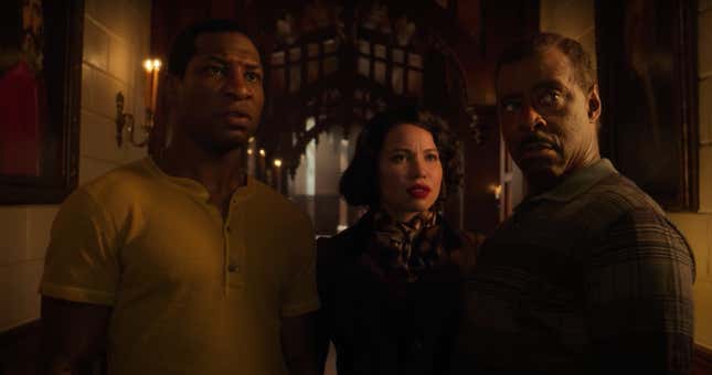 Atticus “Tic” Freeman (Jonathan Majors), left; Letitia “Leti” Lewis (Jurnee Smollett); and “Uncle George” Freeman (Courtney B. Vance) inside the Ardham Lodge. 