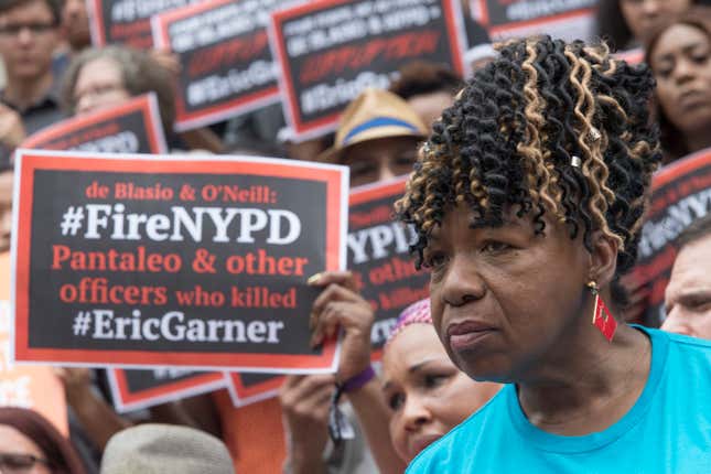 Gwen Carr, Eric Garner’s mother, surrounded by supporters at an NYC rally in July 2018