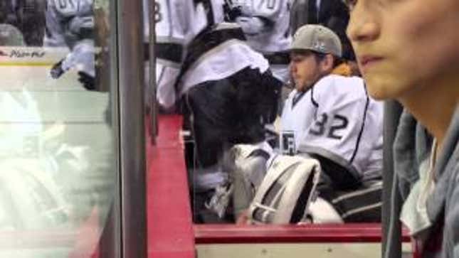 Jonathan Quick Slips A Fan An Autograph From The Bench