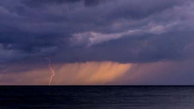 A storm over the water in Spain.