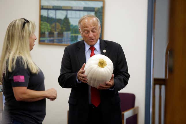 Steve King forced this pumpkin to turn white before agreeing to hold it.