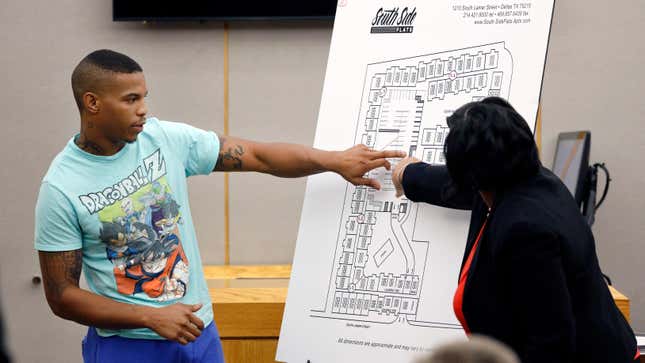 In this Sept. 24, 2019, photo, Joshua Brown answers questions from Assistant District Attorney LaQuita Long while testifying during the murder trial of Amber Guyger, in the death of Botham Jean. Now, Brown has been killed, shot to death Oct. 4, 2019.