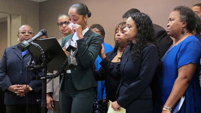 Jazmyne Childs cries during a news conference Sept. 25, 2019, as she describes the sexual harassment she says she endured while employed by the North Carolina chapter of the NAACP, in Raleigh, N.C. 