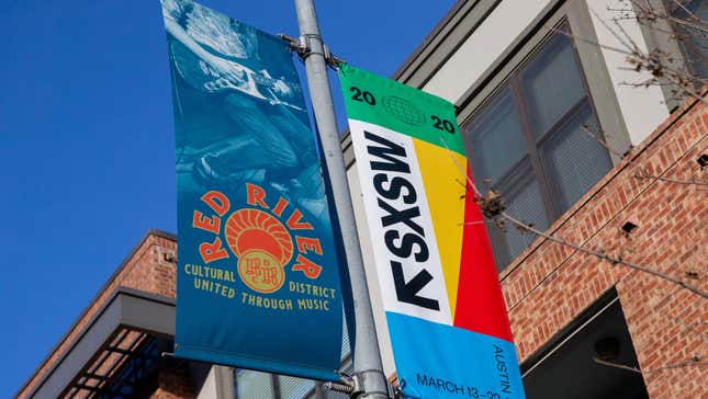 SXSW 2020 banners are seen in the Red River Cultural District on March 6, 2020, in Austin Texas.