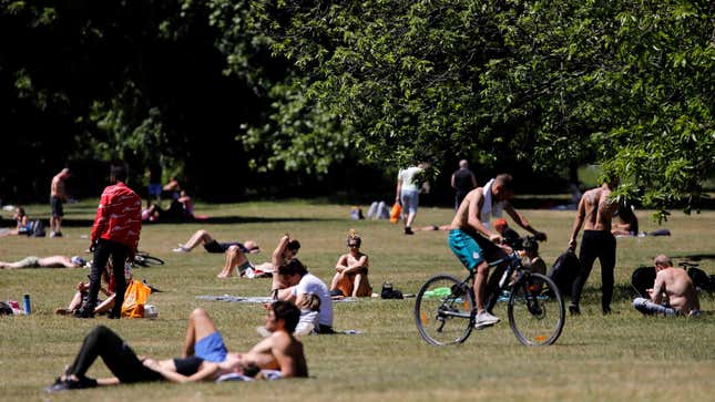 A group of people in Hyde Park, which will soon be the site of hundreds of acts of public fornication!