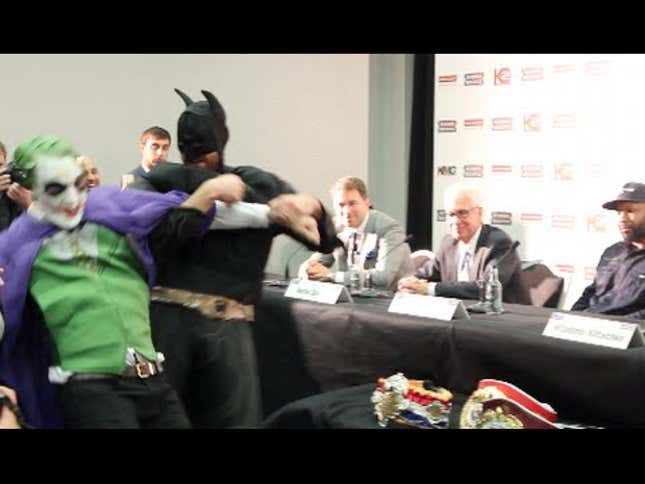 Boxer Dresses Up Like Batman, Fights The Joker At Press Conference