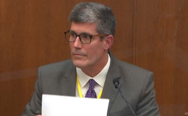 Dr. Andrew Baker, Hennepin County Medical Examiner, testifies as Hennepin County Judge Peter Cahill presides Friday, April 9, 2021