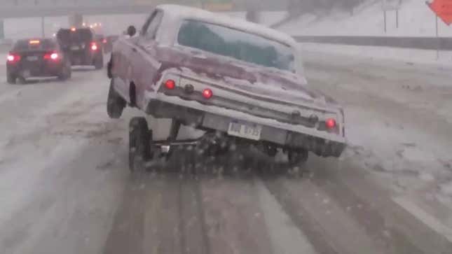 This Lowrider Driver Three-Wheeling In The Snow Is The Hero America Needs