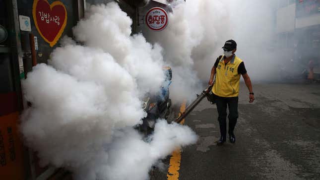 A worker disinfects an alley to prevent the spread of the coronavirus on August 29, 2020 in Seoul, South Korea.