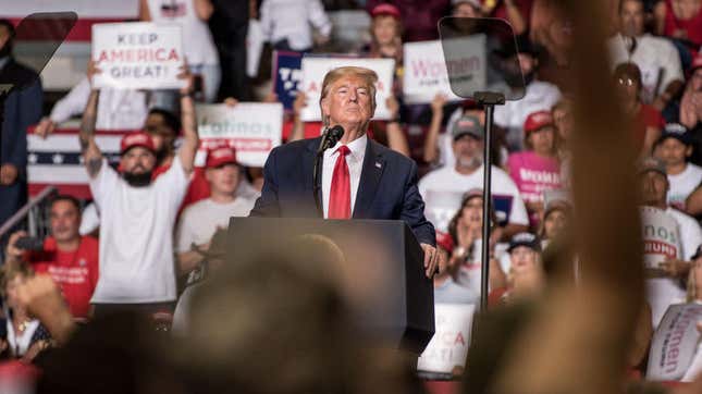 Donald Trump, with a smattering of “Latinos for Trump” signs behind him, speaks in New Mexico, a state he lost in 2016, during a campaign rally Sept. 16, 2019, at the Santa Ana Star Center in Rio Rancho, where he tried to enlist support from “the Hispanics” in his re-election efforts.