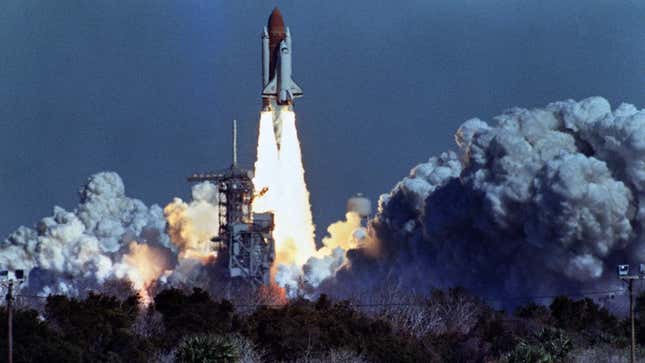 US space shuttle Challenger lifts off 28 January 1986 from a launch pad at Kennedy Space Center, 72 seconds before its explosion killing it crew of seven. Challenger was 72 seconds into its flight, traveling at nearly 2,000 mph at a height of ten miles, when it was suddenly enveloped in a red, orange and white fireball as thousands of tons of liquid hydrogen and oxygen fuel exploded.
