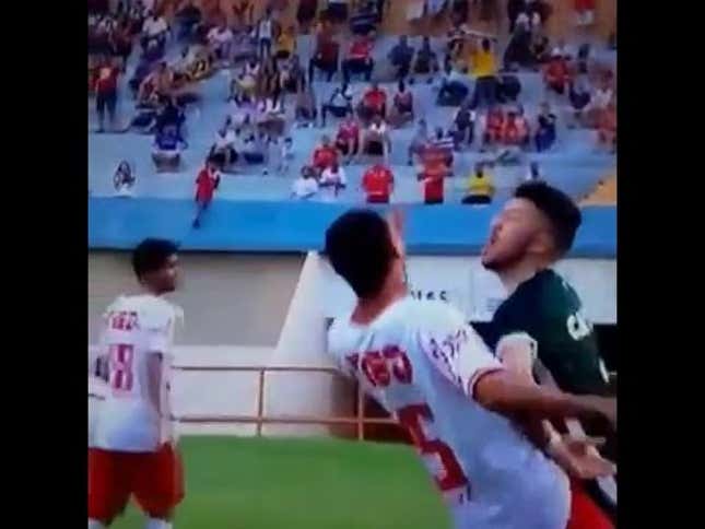 I Can't Stop Watching These Two Soccer Dummies Flop At The Same Time