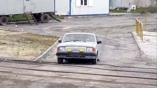 Watch A Whole Herd Of Grown-Ass Russians Spill Out Of A Junky Little Sedan