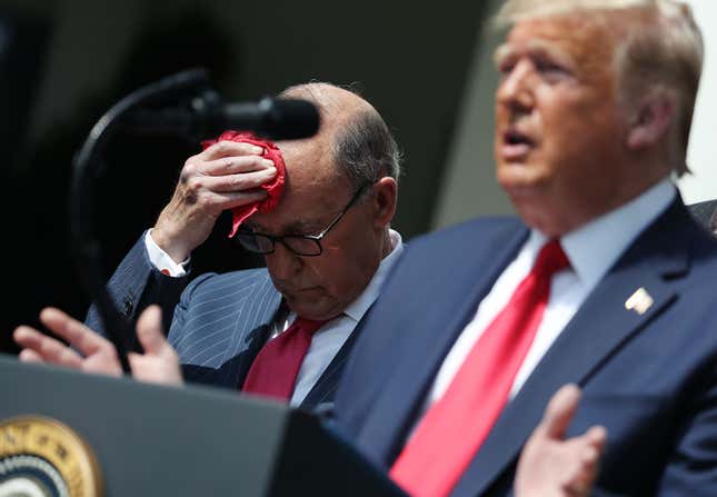 President Donald Trump speaks while flanked by White House economic adviser Larry Kudlow, left, during a news conference in the Rose Garden at the White House June 05, 2020 in Washington, DC.